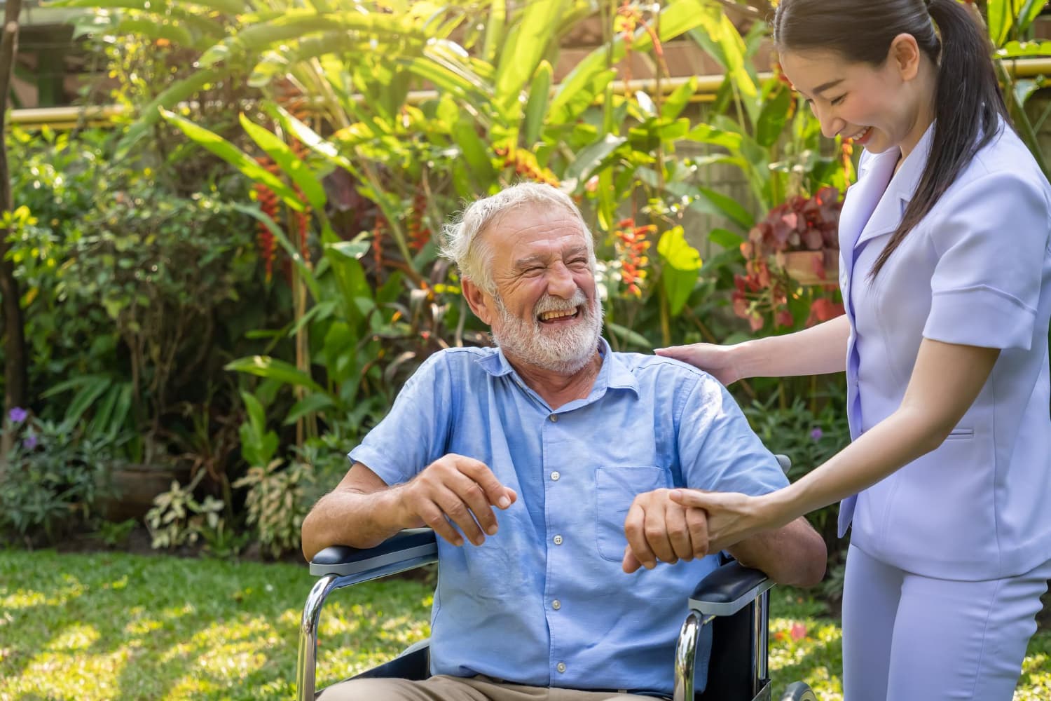Caregiver sharing a warm conversation with an elderly client