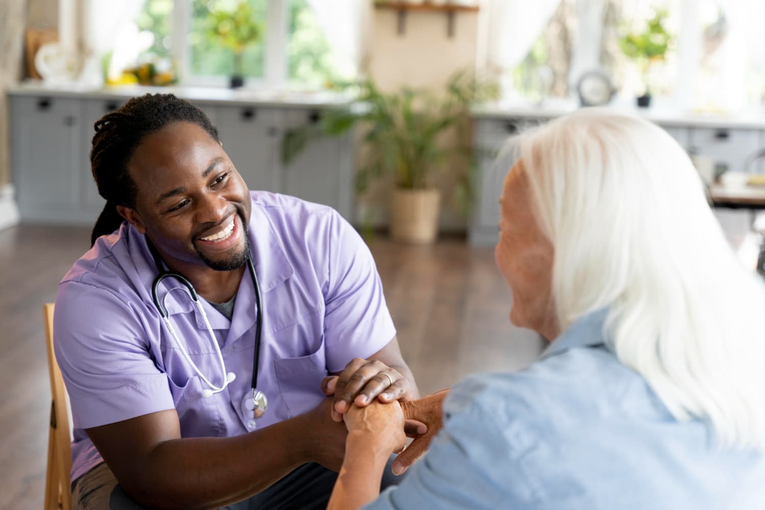 Nurse providing attentive care to an elderly client